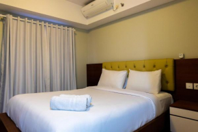 Amazing 2BR with City View The Wave Kuningan Apartment By Travelio
